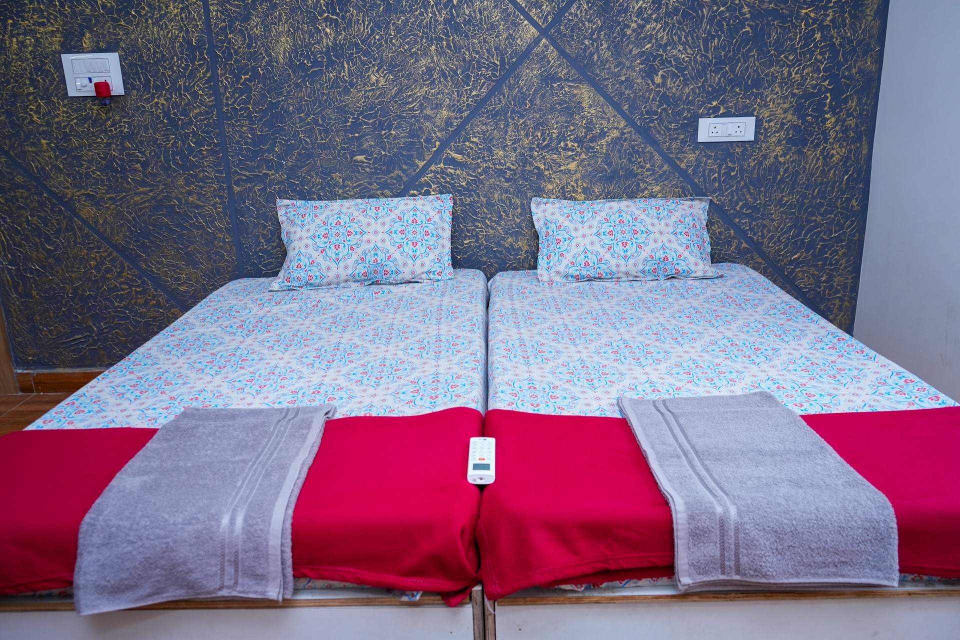 Twin beds made up for arrival