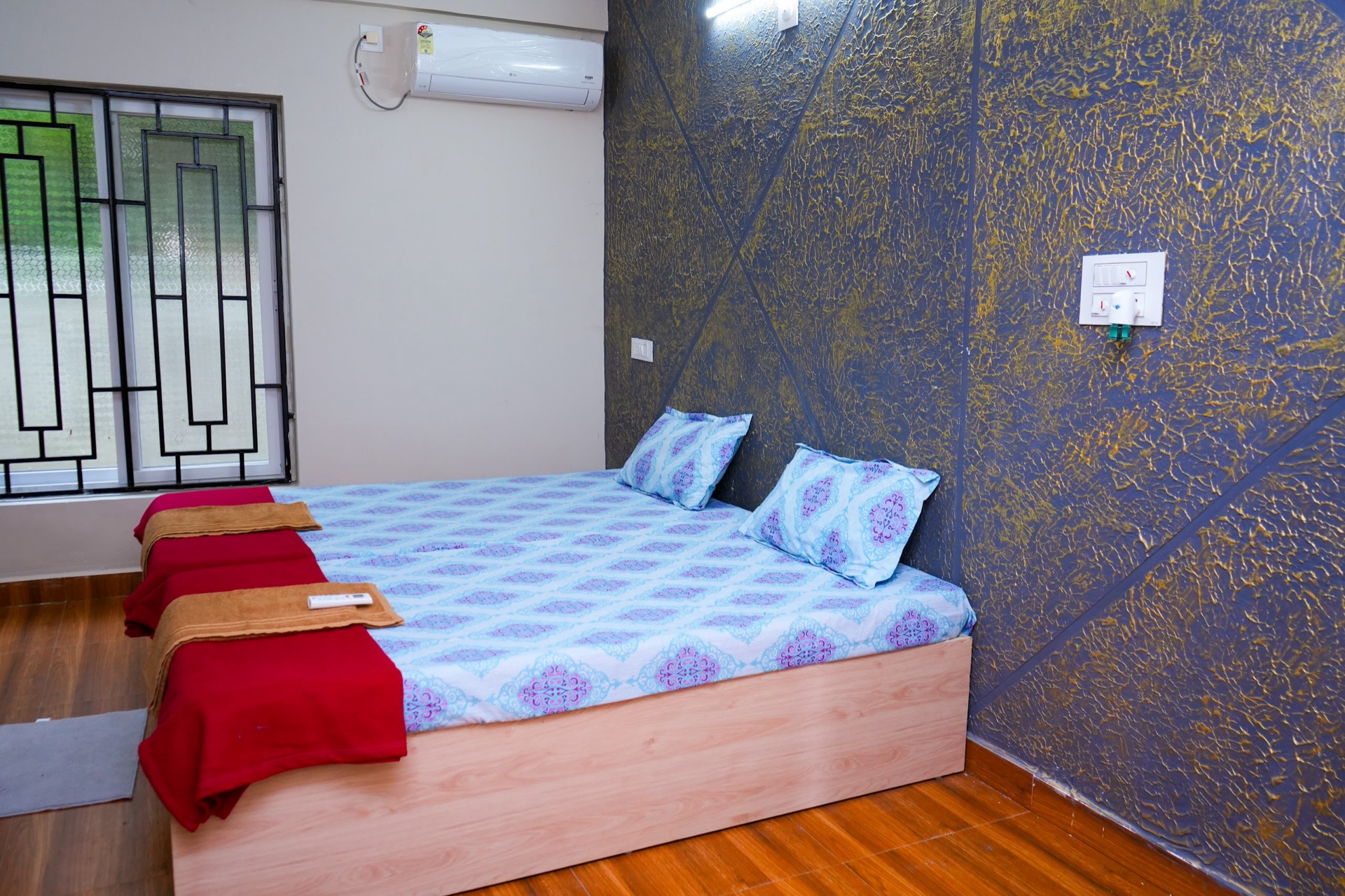 Double bedroom opening to the tree line
