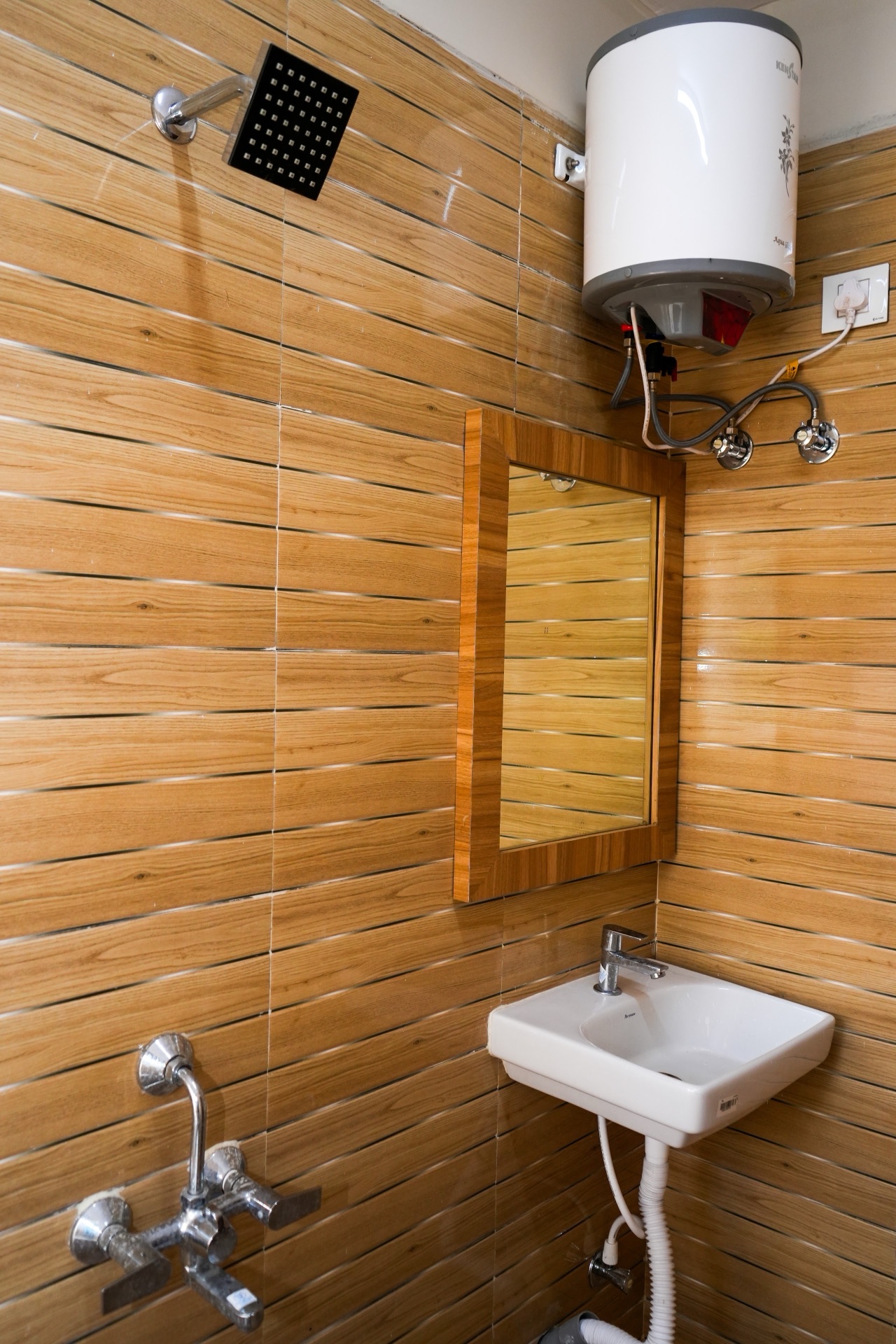 Bathroom with hot shower and basin