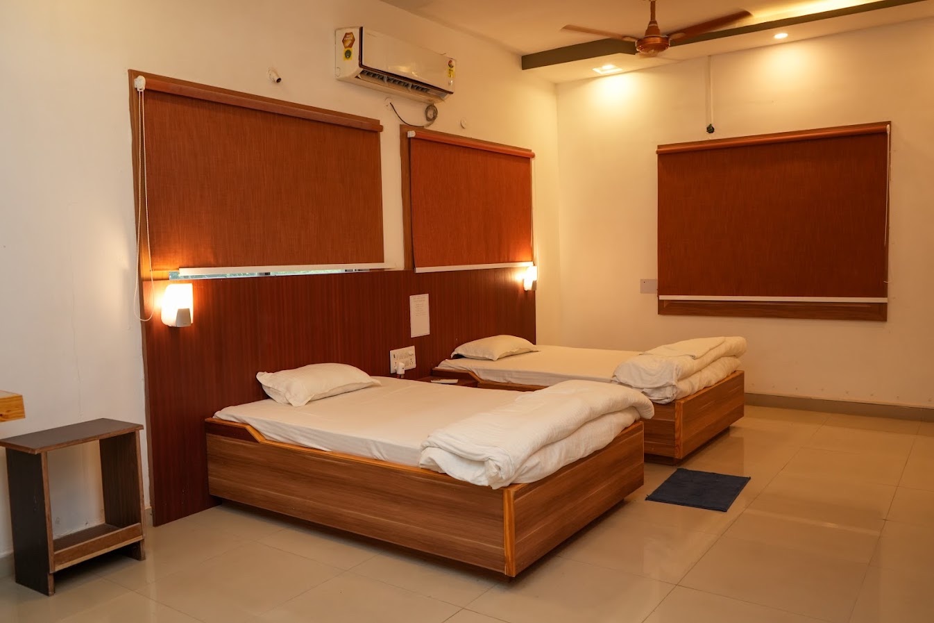 Twin-bed room with reading lights and blinds